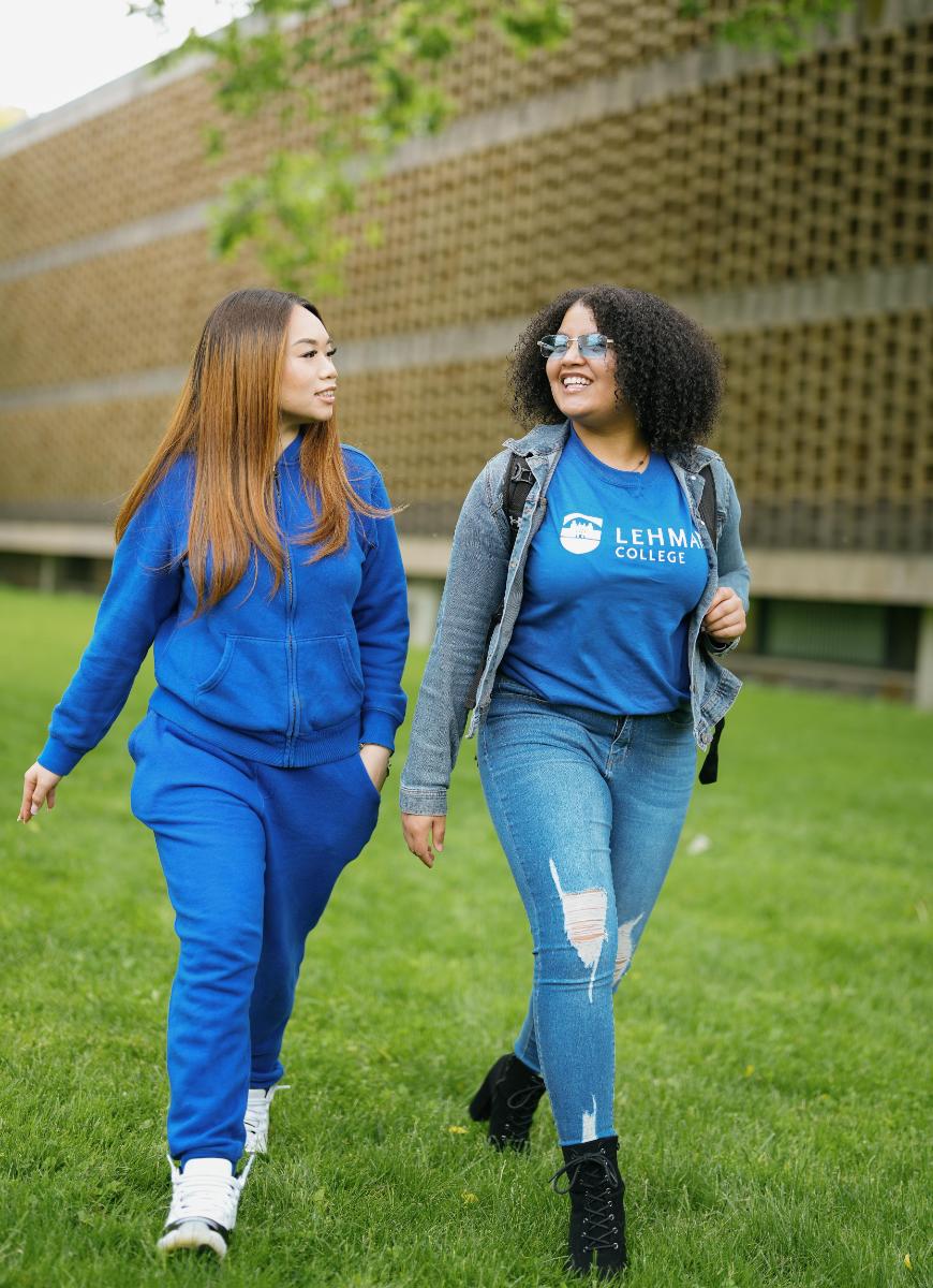 Two lehman students walking on campus