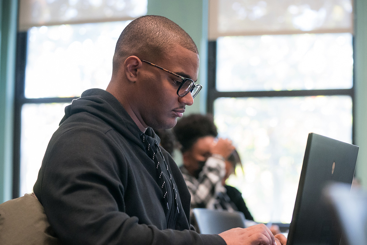 Photo of student using laptop