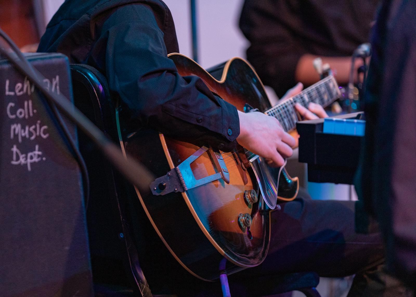 Musician playing a guitar