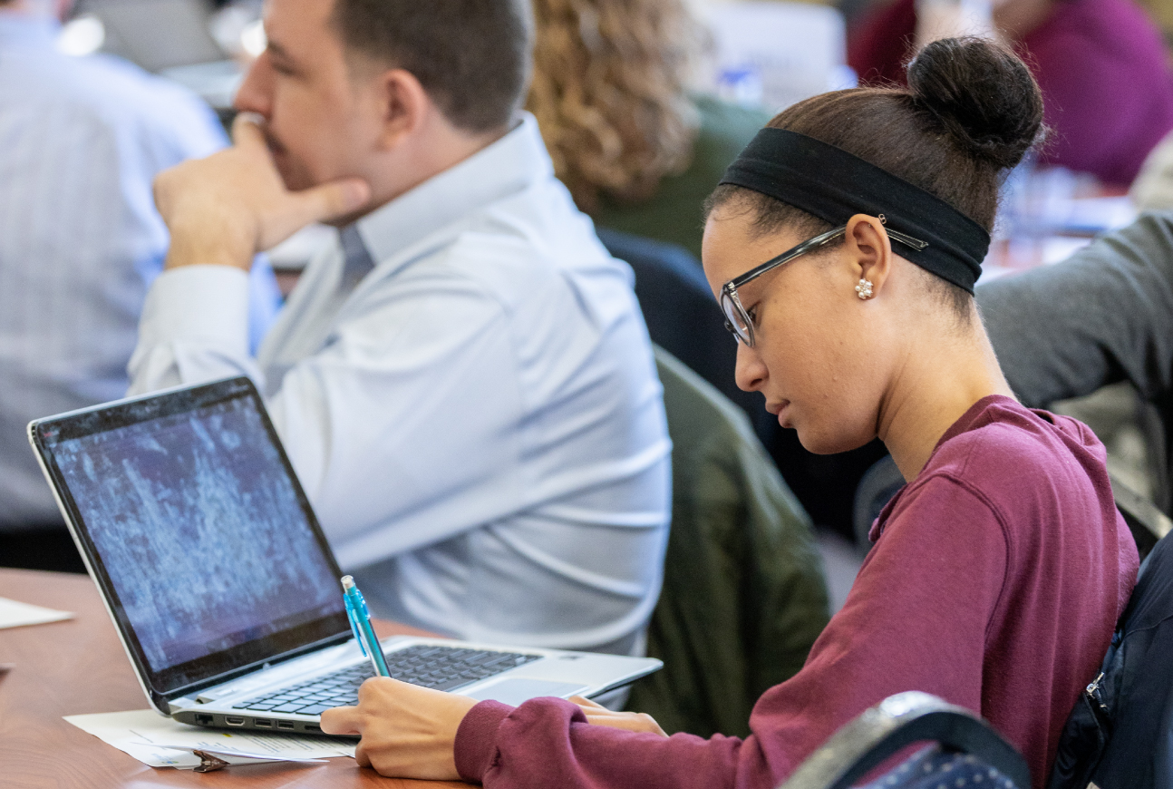 Photo of student attending an information session