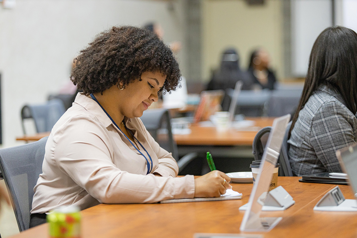Photo of female student writing