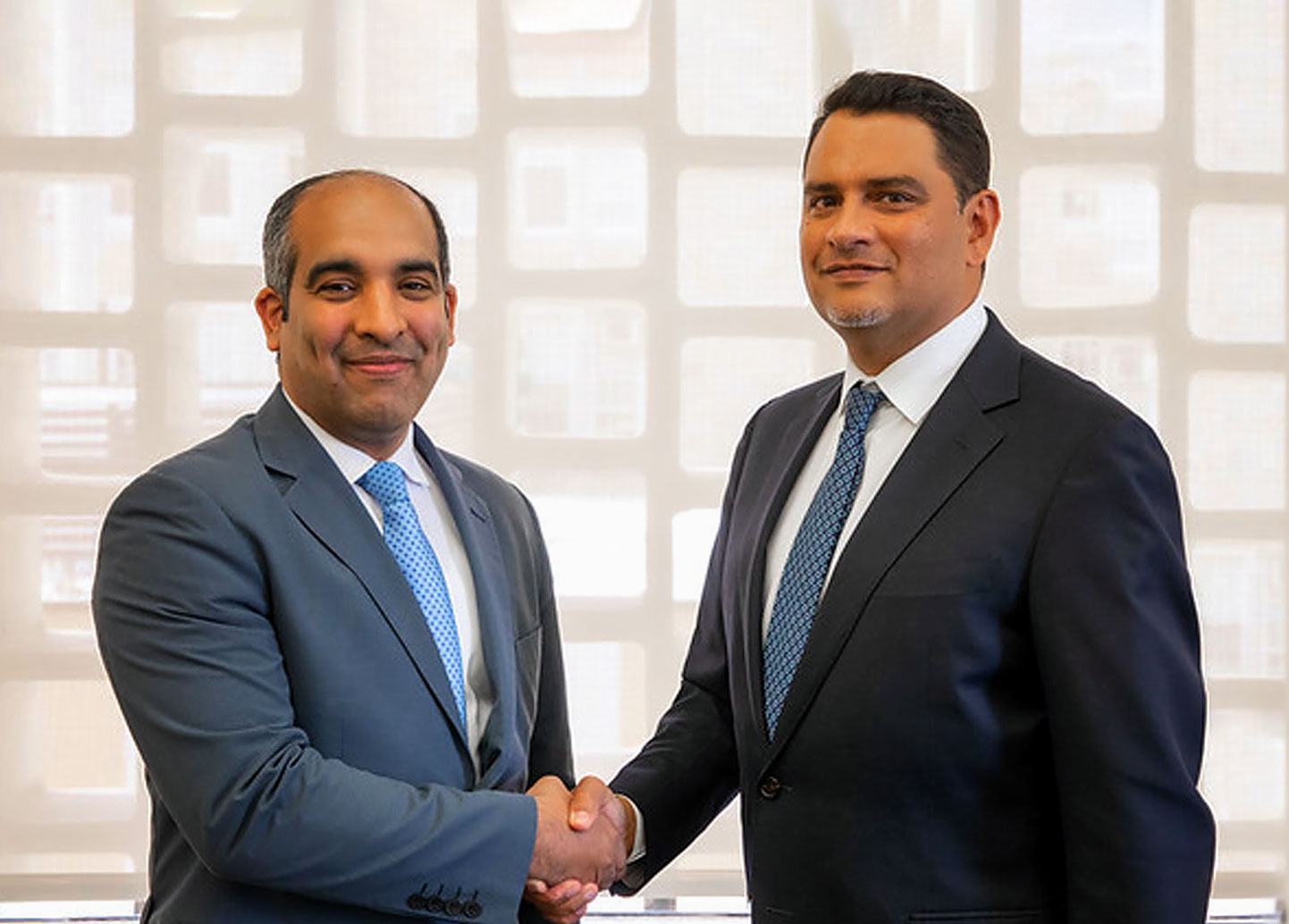 Photo of Lehman College President José Luis Cruz meeting with ITLA President José Armando Tavárez of the Dominican Republic Institute