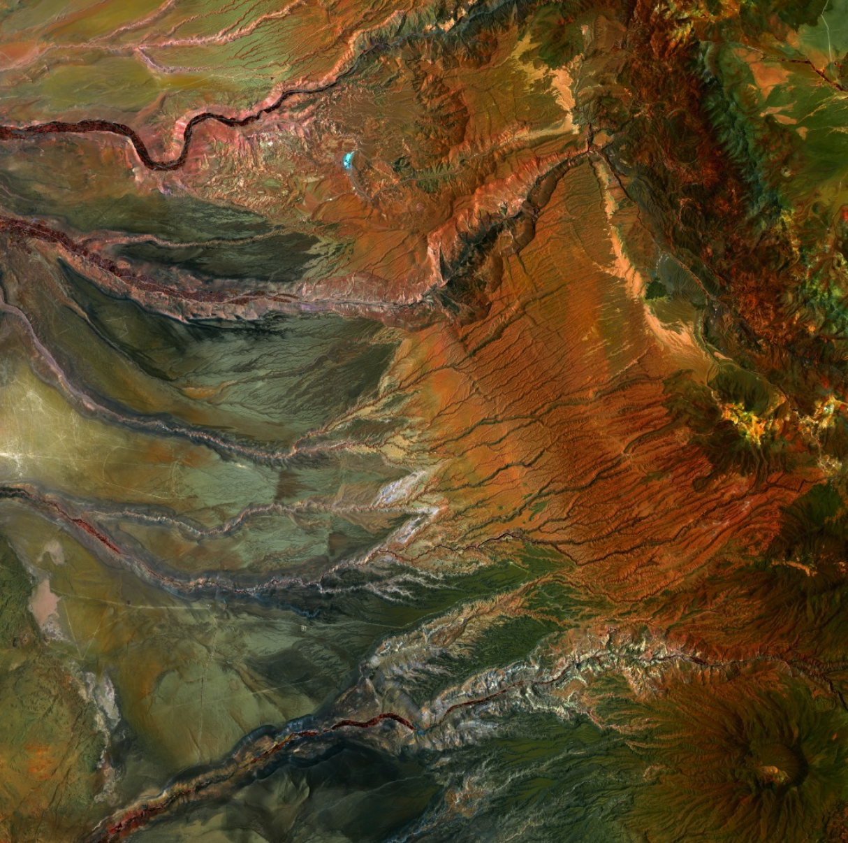 A satellite image of mountains and desert.