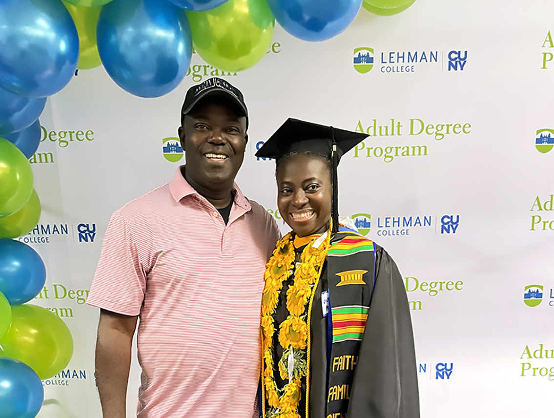 Photo of the Week (CROPPED): Eric Agyenim-Boateng, a prior Adult Degree Program graduate celebrates with Victoria Agyenim-Boateng '23, now also an Adult Degree Program graduate. (Photo by Pam Hinden)