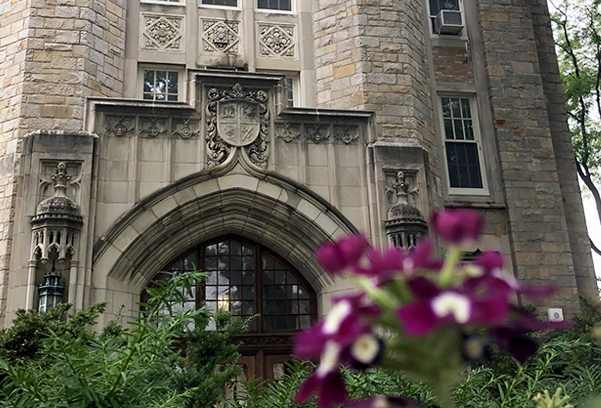 Photo of the Week (Cropped): Maria Sanchir shared a flower-framed view of Davis Hall.

