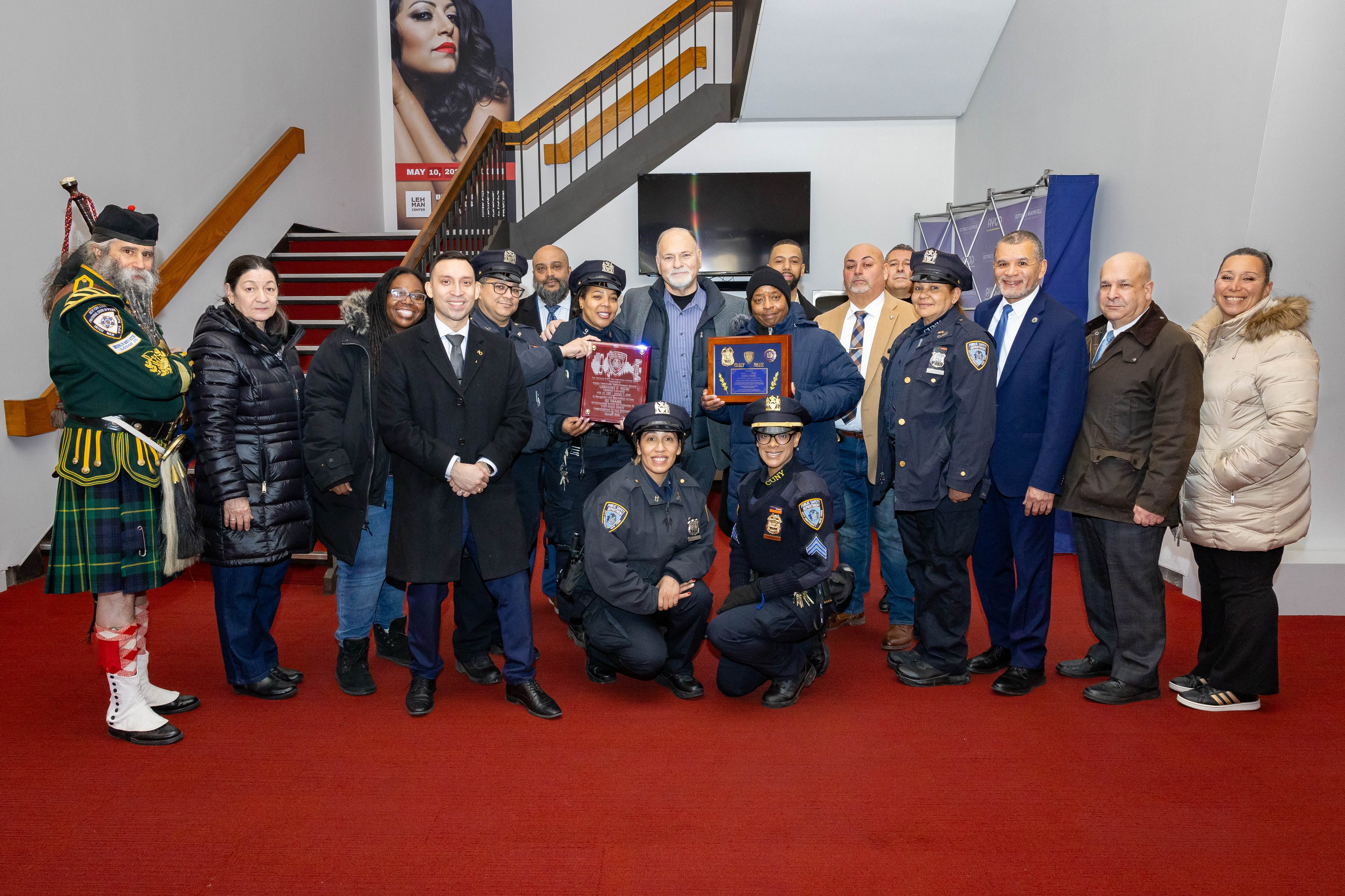 Deputy Director of Public Safety Greg Nigri (standing, center) with colleagues