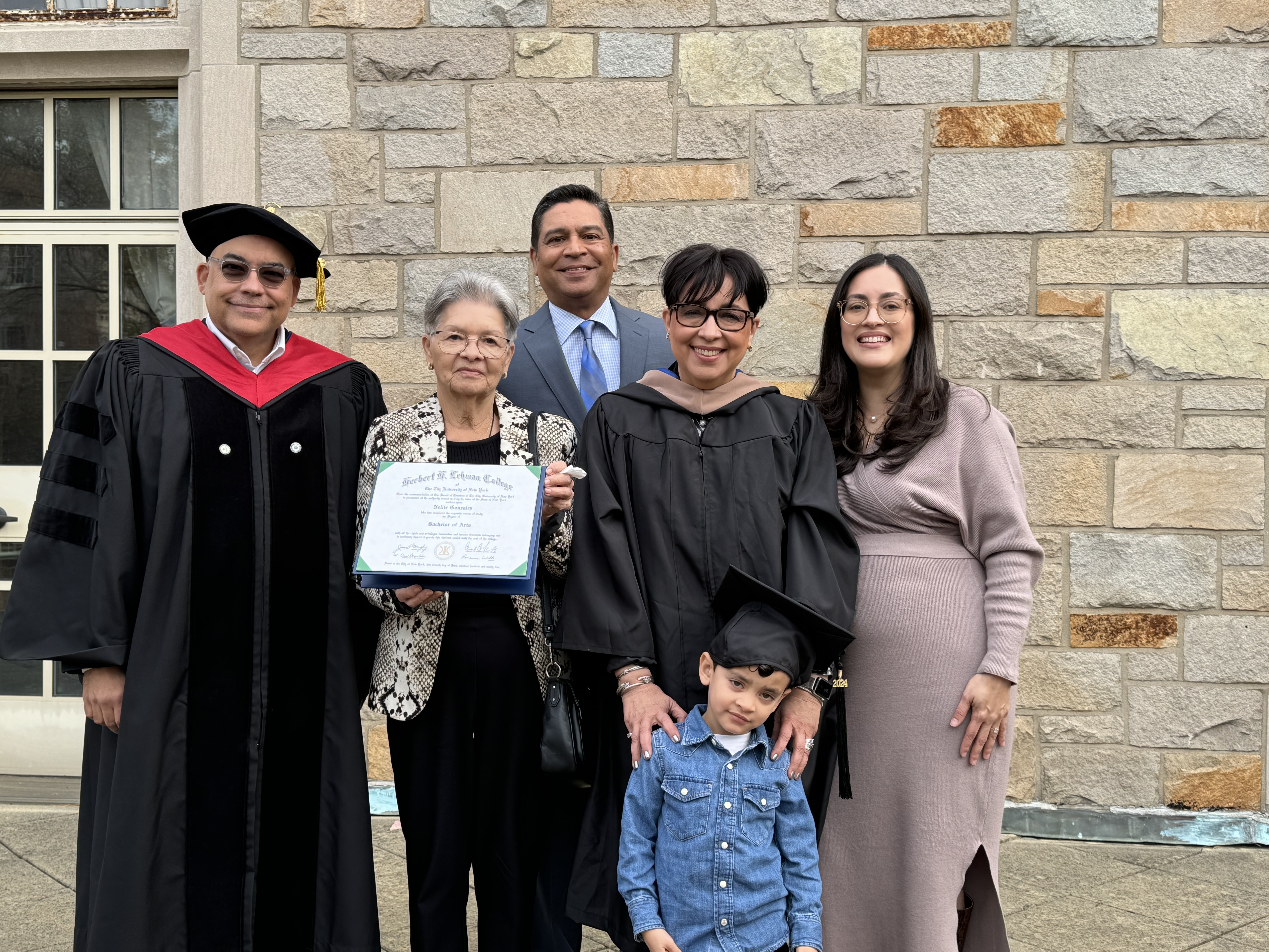 Nellie Borrero, second from right, celebrated her "official" graduation with her family in attendance. 