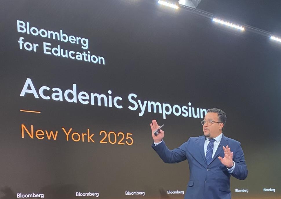 Alexander Núñez-Torres on stage at the Bloomberg Academic Symposium