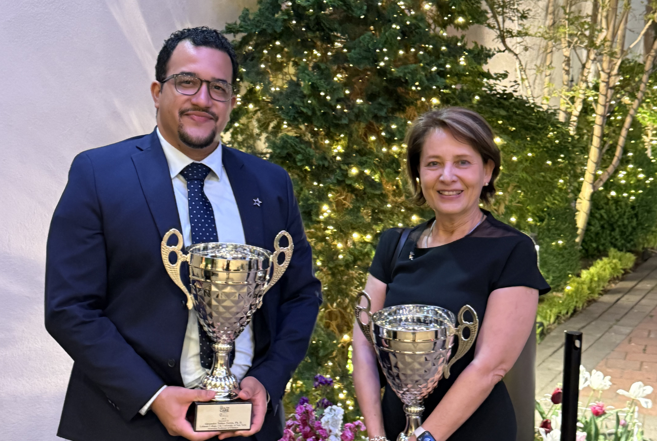 Dene Hurley, Dean of the School of Business, and Associate Professor Alexander Núñez-Torres at the 2025 Schneps Media Healthcare Heroes Award
