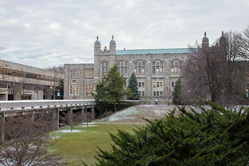 A dusting of snow is seen in front of the Old Gym at the start of winter session  
(Photos by Lehman College Multimedia Center)