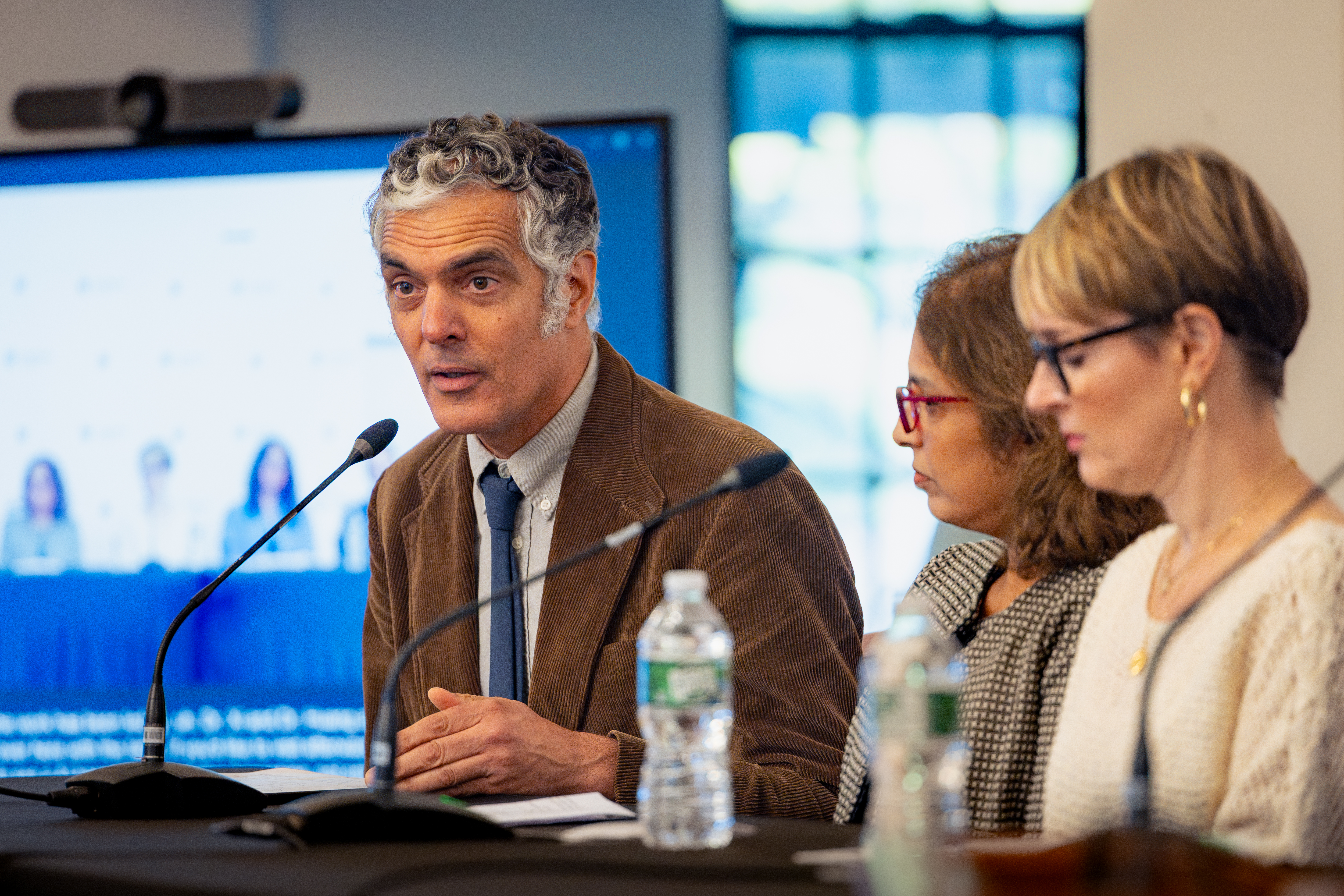 Stephen Redenti, Ivelyse Andino, and Alison Connelly-Flores in a panel discussion.