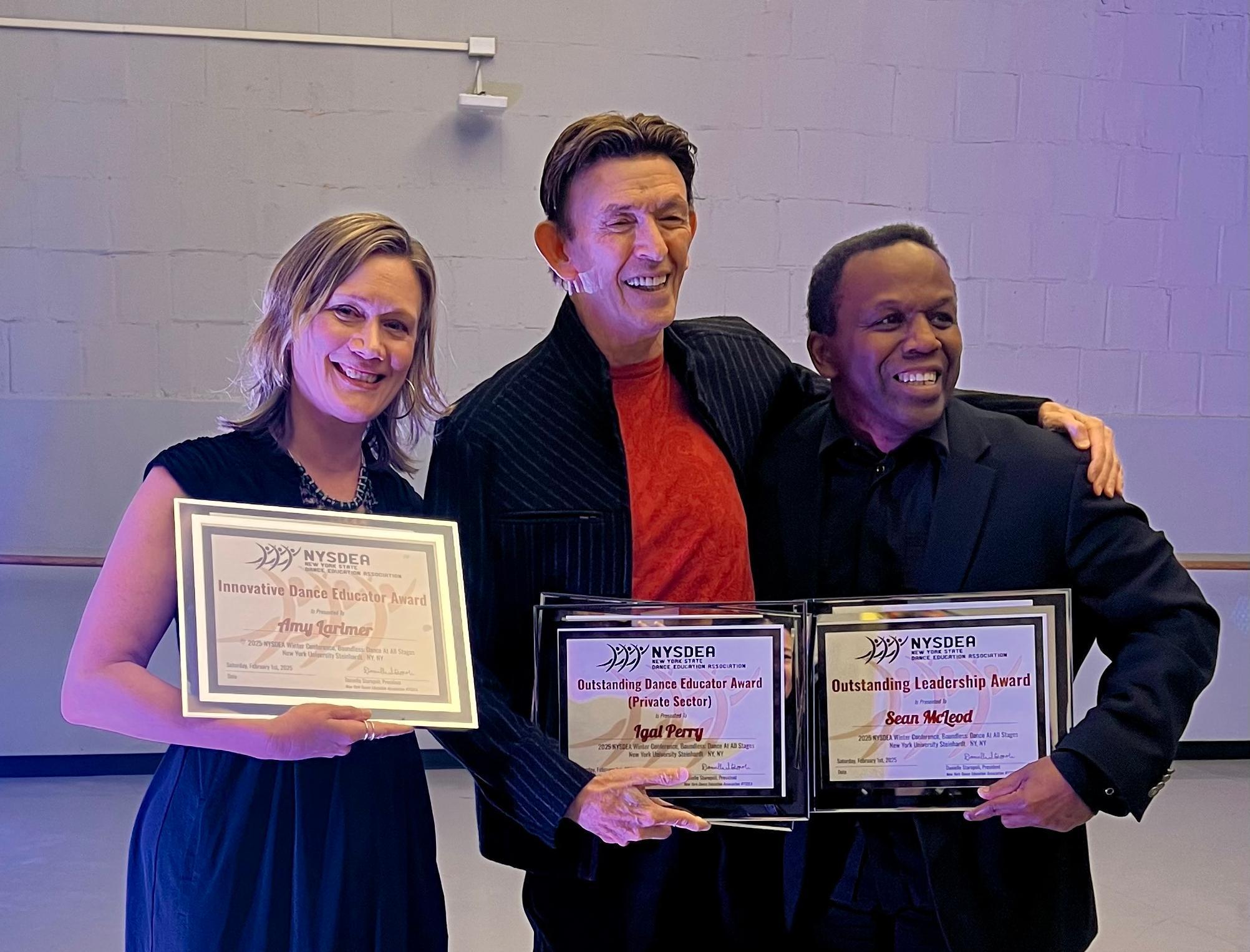 Amy Larimer, left, with fellow NYSDEA award winners Igal Perry and Sean McCloud