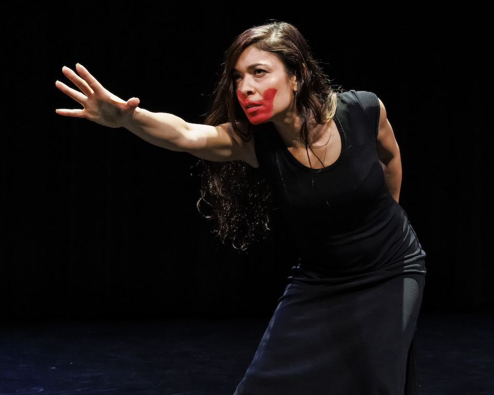 Portrait of "La Bruja," Nuyorican spoken word poet Caridad De la Luz, in performance