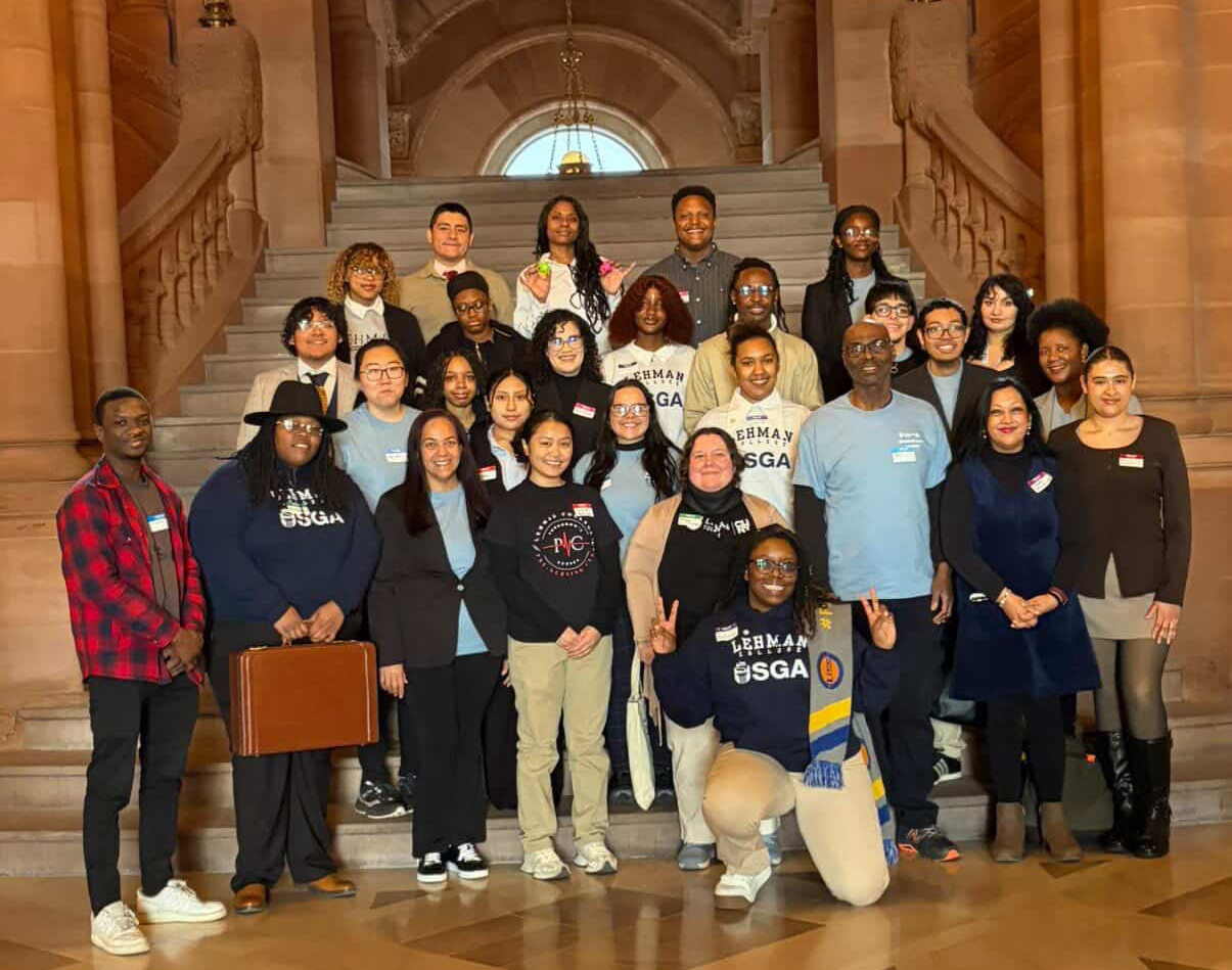 A group of students and staff inside the New York capitol building