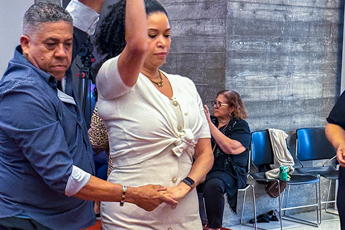 Cropped photo of Salsa Under the Stars dancers in PAC