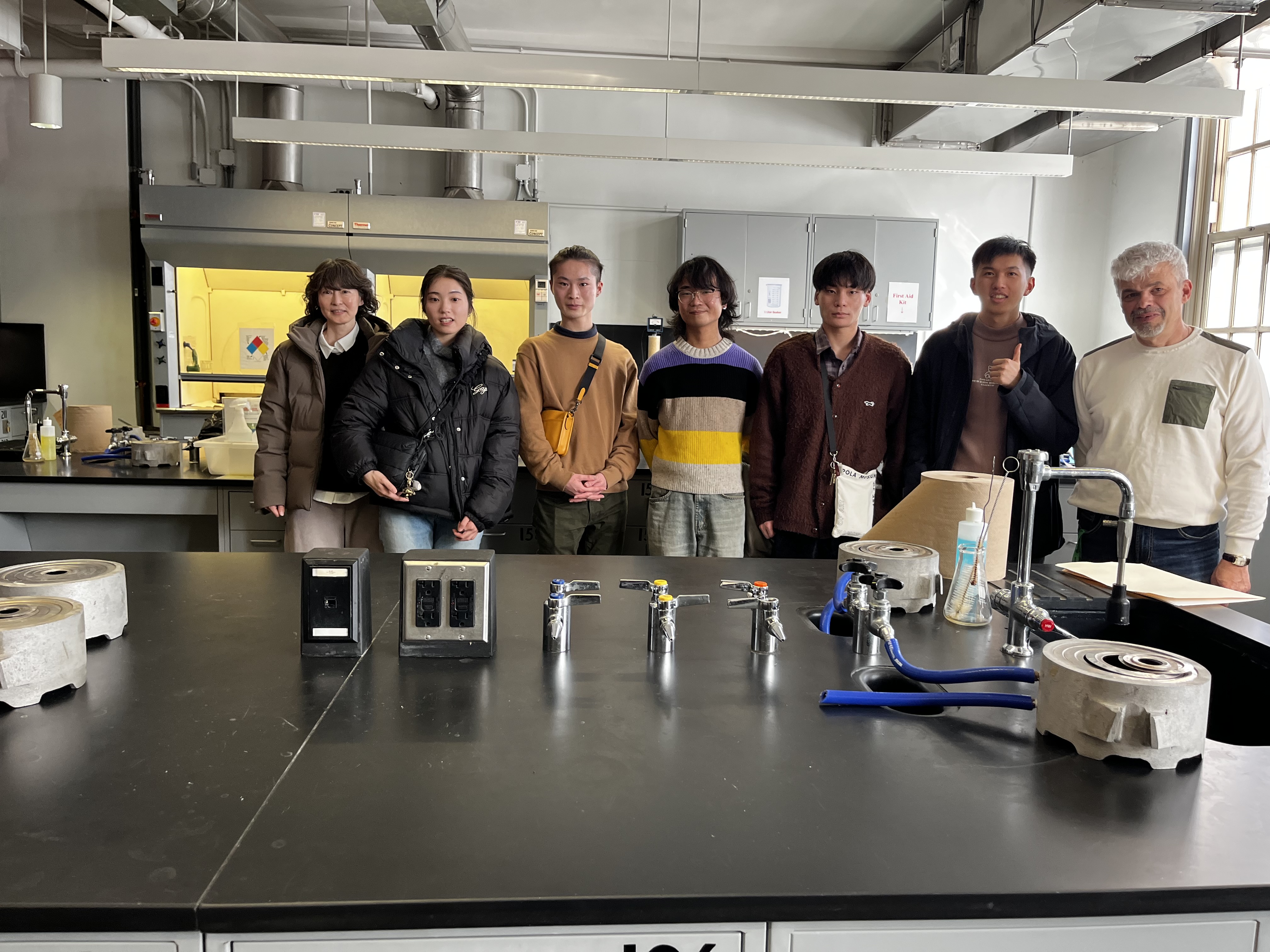 Students from Toyahashi University and Professor Andrei Jitianu in the chemistry lab.