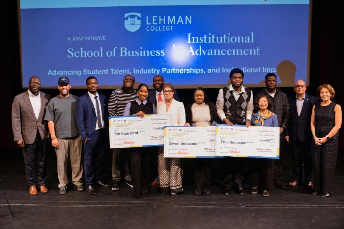 Pitch Up Lehman winners and judges with presentation checks.