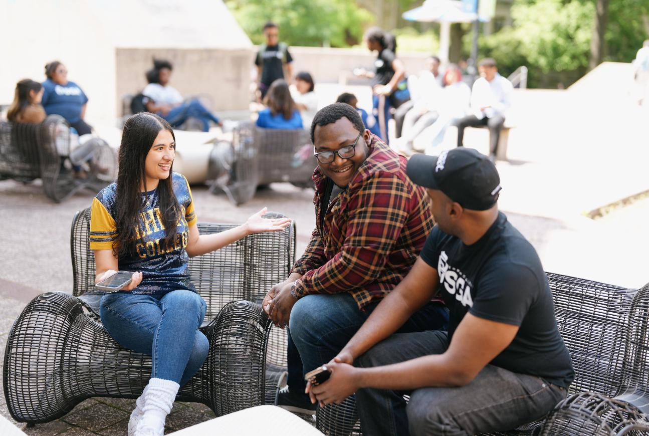 Lehman Students  together on a bench