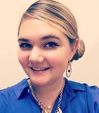 Student with blonde hair and wearing a blue shirt