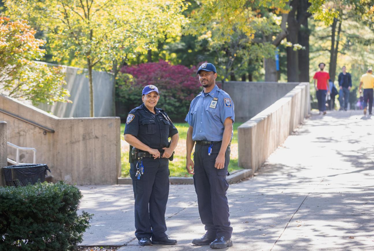 Two Public Safety Officers smiling