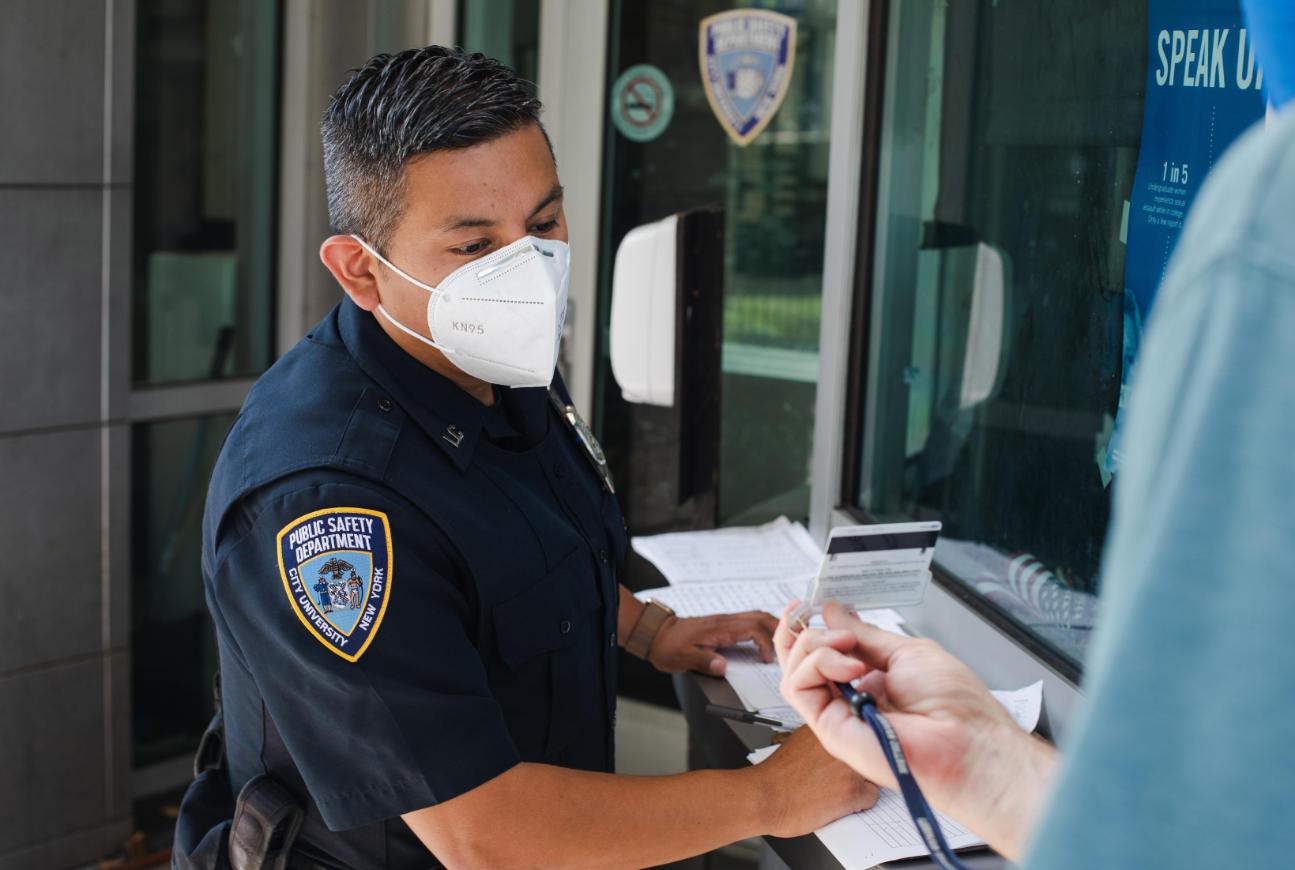 Public Safety Officer Checking ID