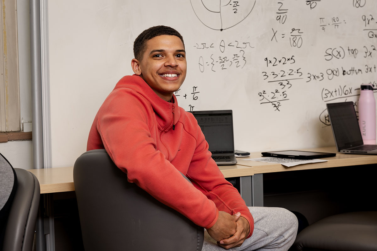 Photo of student sitting down in math class