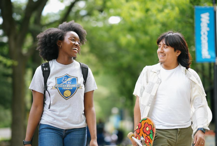 Lehman Students talking with each other on campus