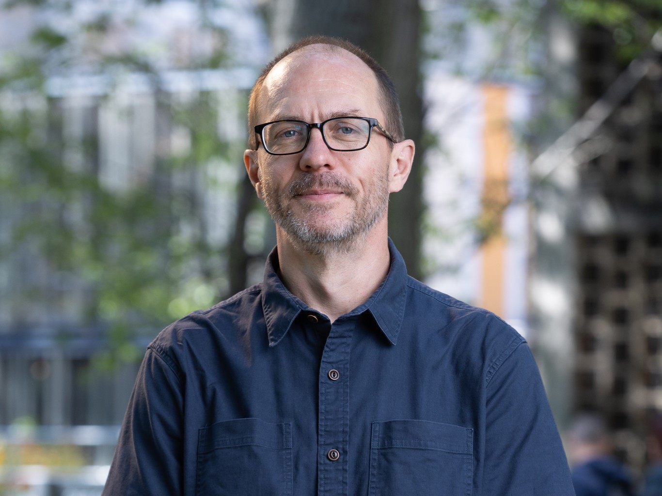 Headshot of faculty member standing