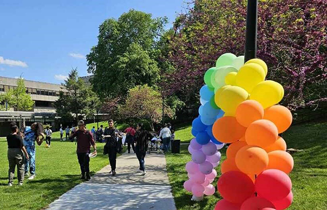 Photo of students and balloons in Counseling event