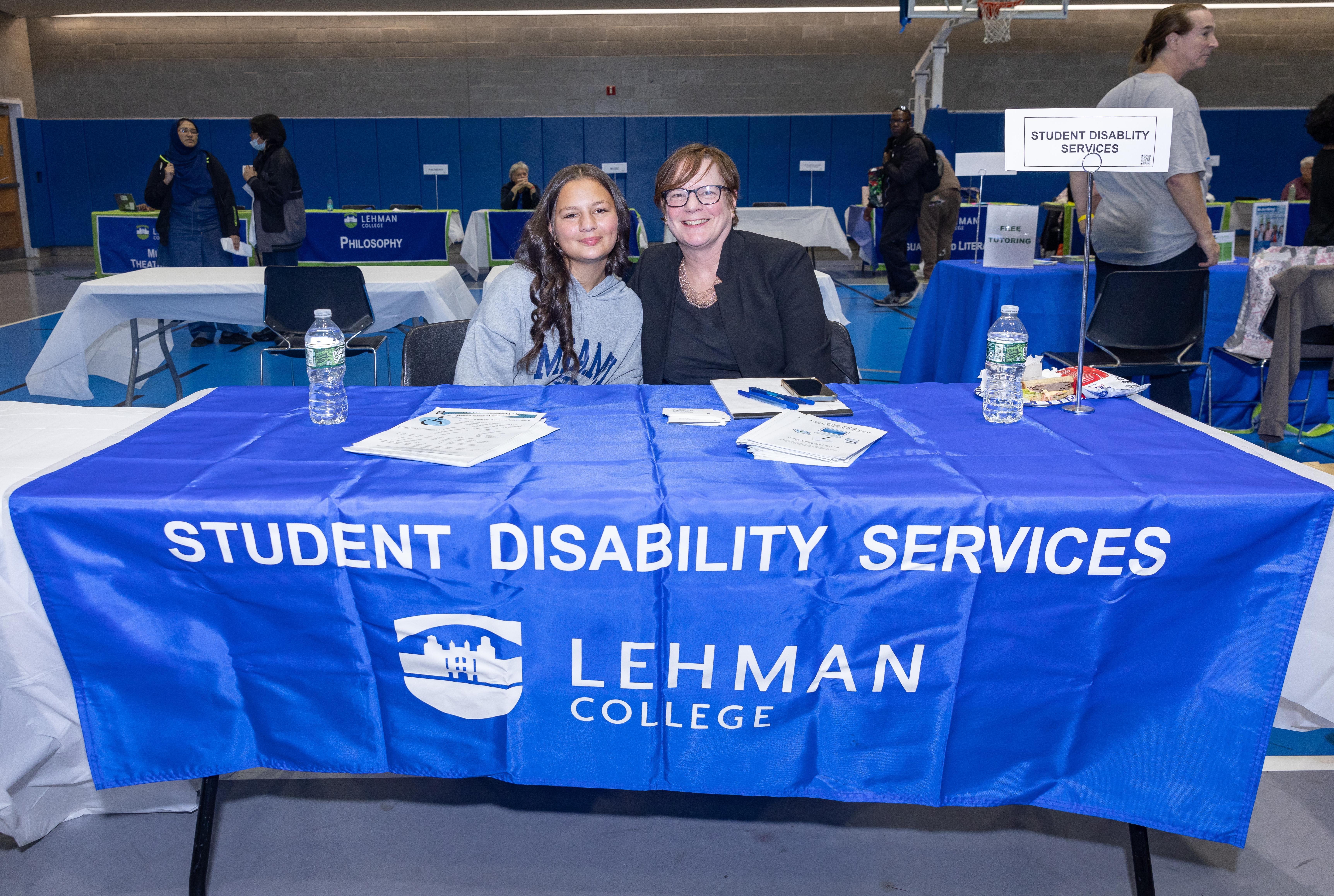 Student Disability Services table at a Lehman College campus fair.