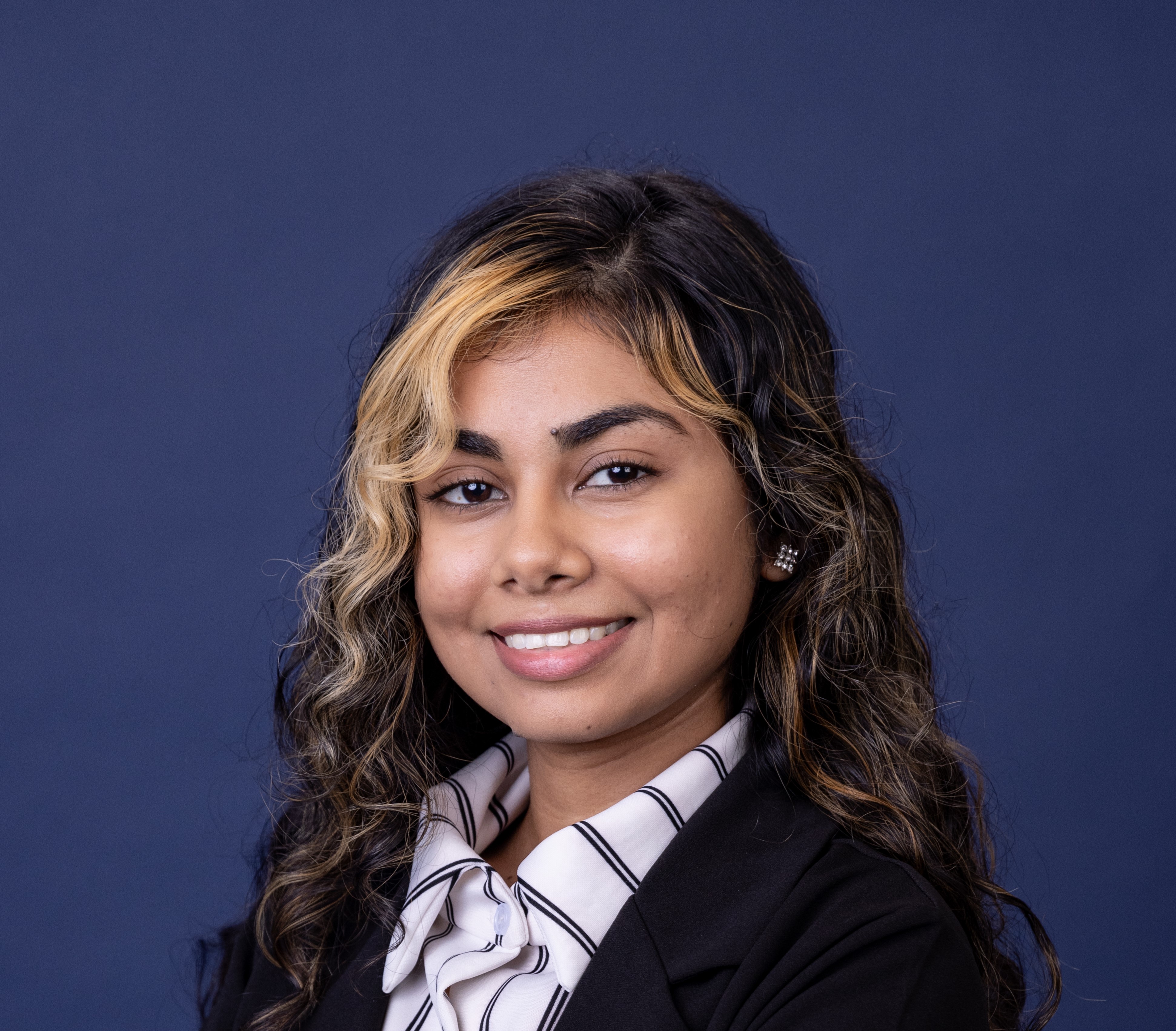 Headshot of UMLP student Omadai Sukul